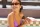 woman smiling in a swimming pool