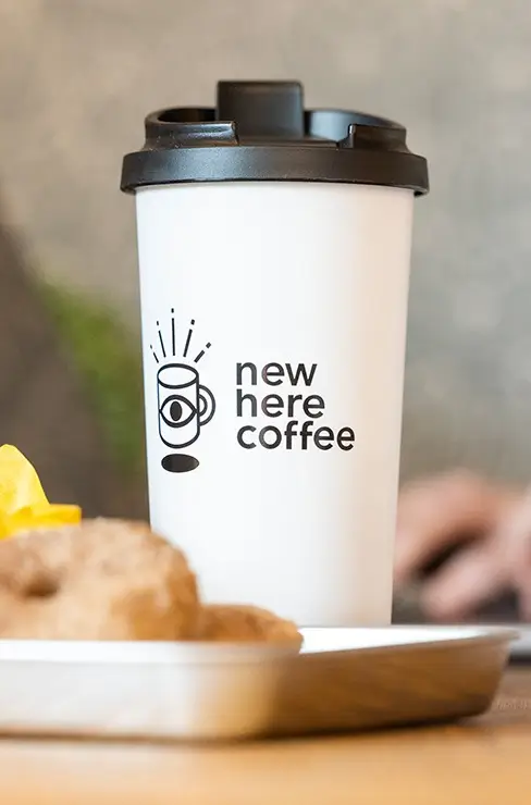 New Here Coffee cup